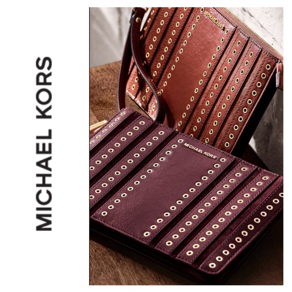 Michael Kors Brooklyn suede grommet clutch in brown